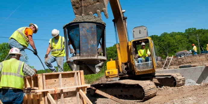 Workers with machine