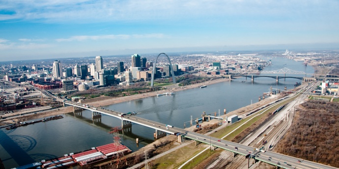 st louis with arch, bridges and boats