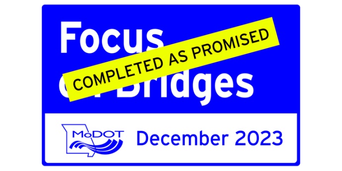 Focus On Bridges Completed As Promised sign