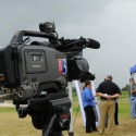 a reporter interviews a modot worker