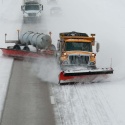 Snow plowing shot from above