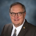 Warren Erdman, Commissioner