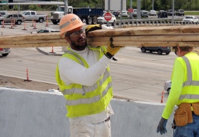 Crews work on building the Route 141 flyover ramp