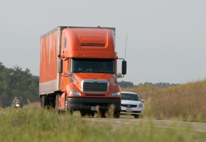 a semi truck driving on the highway