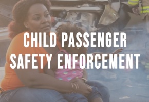 a mom and her child in front of a wrecked car