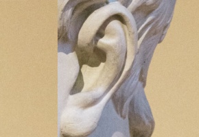 Photo detail of the ear from a classical marble bust