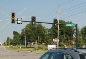 Image showing a flashing yellow left turn arrow in action