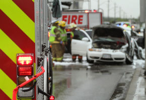 Firefighters assisting with a crash