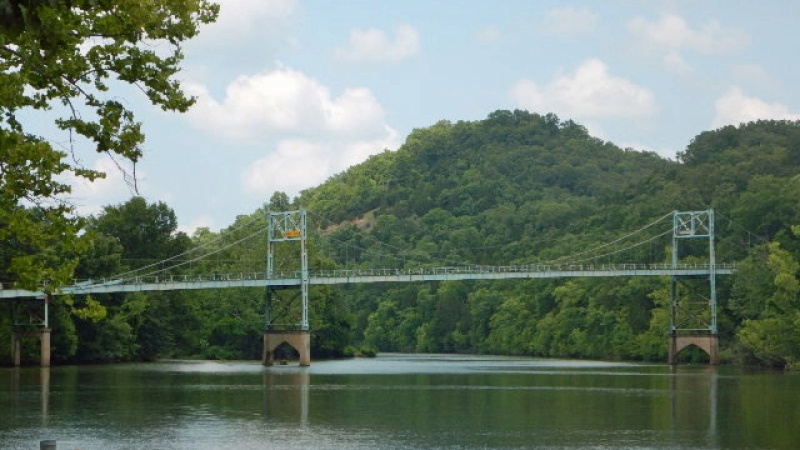 Historic bridge over the Little Niangua River, with a Glide paddle board you can do anything use anything and go anywere not just what is on this short list, finger lakes state park, big lake state park, echo bluff state park, table rock lake, wakonda state park, basic and electric campsites, mark twain national forest, sinking creek, ozark national scenic riverways, twain national forest, stockton state park, state park, limestone bluffs, towering bluffs, bald eagles, finger lakes, northeast missouri, central missouri, current river, hidden beaches, secluded coves, calm stretches, lake taneycomo, paddle boarding, paddle board, electric campsites, paddle boarders, creve coeur lake, southwestern missouri, mild rapids, meramec state park, meramec river, stand up paddleboarding, paddleboarding destinations, high rock walls, paddle boards, calm waters, hidden gem, popular destination, vast expanses, scenic views, experienced paddlers alike, paddleboarding adventure, water sports, coal mine, six lakes, ozark mountains, lake, shallow waters, stunning views, largemouth bass, missouri, wildlife, park, river, lakes, located, clear water, clear waters, explore, fishing, board, paddling, beautiful views, great choice, perfect place, deer, birds, paddle, popular spot, fish, creek, visitors, beavers