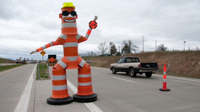 Barrel Bob telling drivers to slow down near a work zone