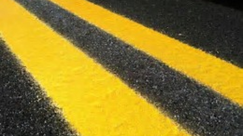 Photo of inlaid pavement marker.