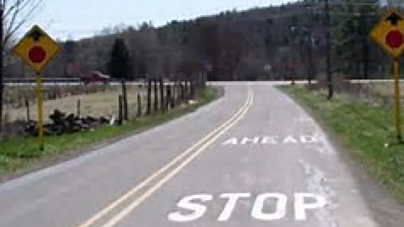 Photo of stop ahead pavement markings