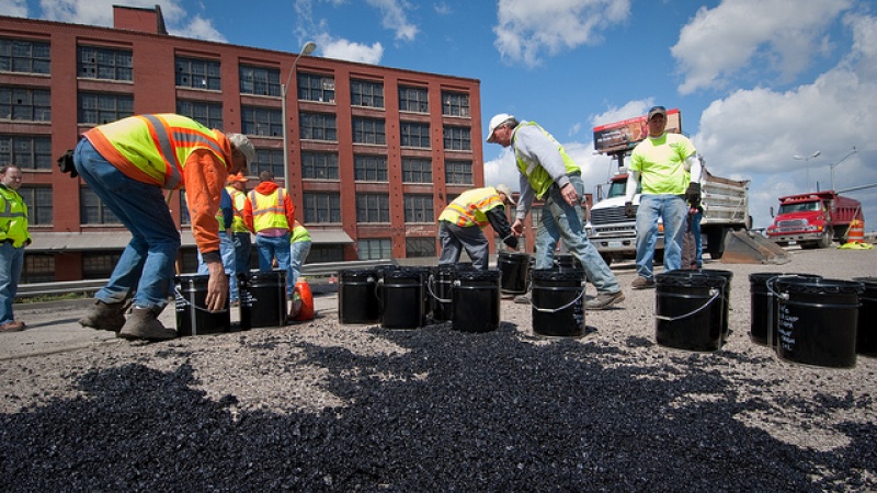 Workers preparing for maintenance procedures