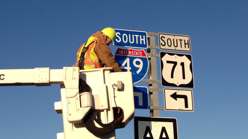 Installation of new I-49 sign in Newton County 2012