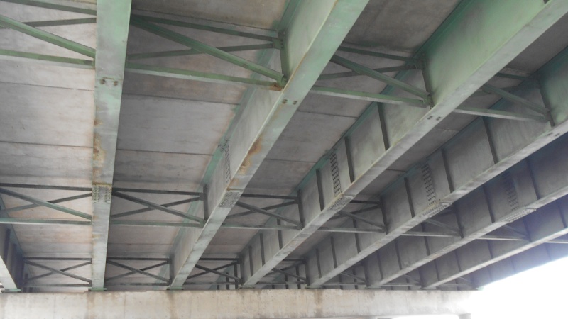 Rust on griders are shown on the I-70 Bryan Road bridge. The picture is an underside view of the bridge. 