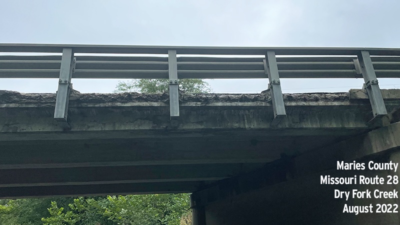 A photo showing the side of the Maries County Route 28 Dry Fork Creek with edge deterioration, taken 2022