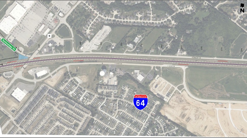 Display shows roadway plans for additional lane on I-64 between log miles 4 and 6. 