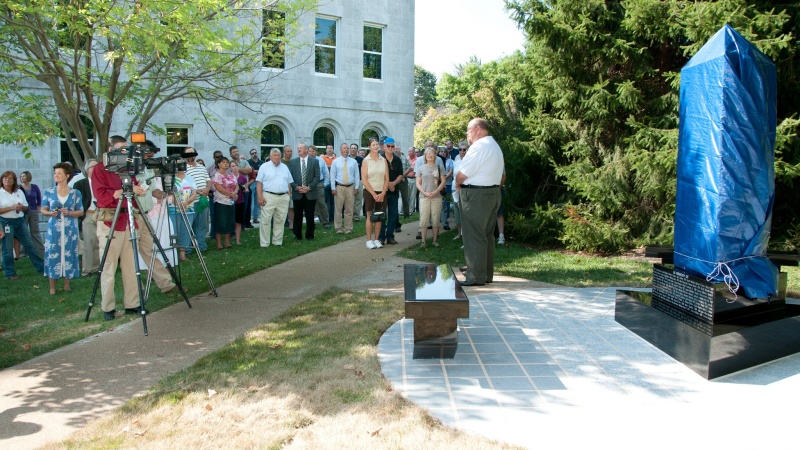 a group attends the dedication ceremony