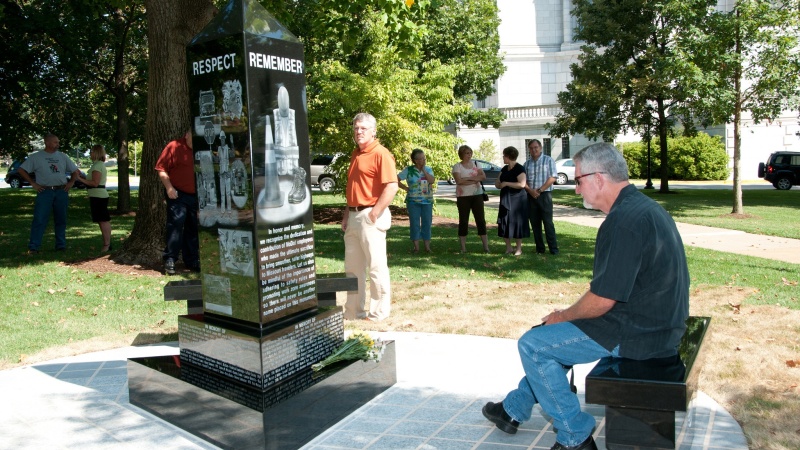 a man admires the memorial